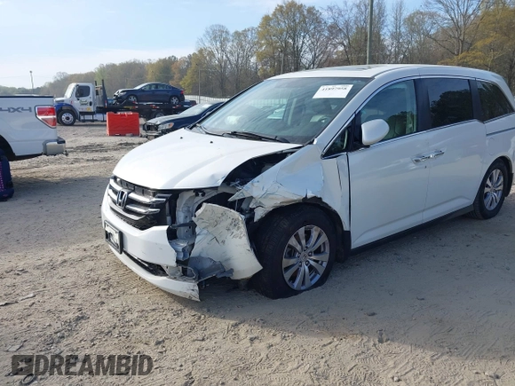 2016 Honda Odyssey EX-L z VIN 5FNRL5H60GB011001, wystawiony jako IAAI lot #41897958 z przebiegiem 126 133 mil mil oraz . Historia ofert i sprzedaży dostępna na DreamBid. Obrazek 6.