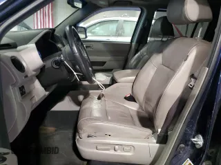2013 Honda Pilot Touring with VIN 5FNYF4H92DB040292, listed as a Copart auction lot 66373005 with 191,692 mi miles and Clean title. Bid and sale history available at DreamBid. Image 7.