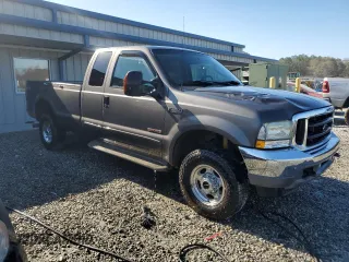 2003 Ford Super Duty F-250 XL with VIN 1FTNX21P03EC11327, listed as a Copart auction lot 86167644 with 191,817 mi miles and Salvage Title. Bid and sale history available at carsss.com. Image 4.
