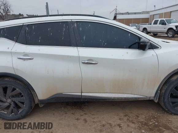 2017 Nissan Murano S with VIN 5N1AZ2MH0HN185795, listed as a IAAI auction lot 41557000 with 182,687 mi miles and . Bid and sale history available at DreamBid. Image 13.