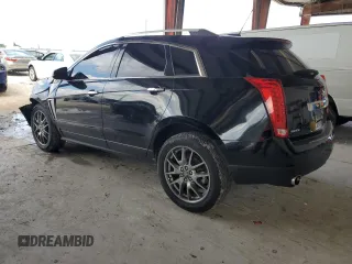 2015 Cadillac SRX Premium Collection z VIN 3GYFNDE38FS596718, wystawiony jako Copart lot #56674245 z przebiegiem 106 379 mil mil oraz Szkody całkowita. Historia ofert i sprzedaży dostępna na DreamBid. Obrazek 2.