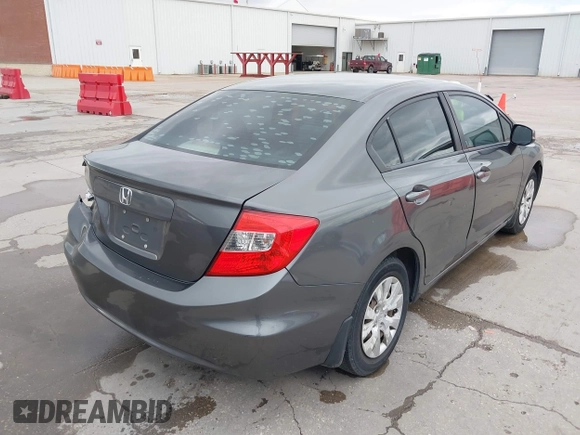 2012 Honda Civic LX z VIN 2HGFB2F51CH600546, wystawiony jako IAAI lot #41920265 z przebiegiem 196 599 mil mil oraz . Historia ofert i sprzedaży dostępna na DreamBid. Obrazek 4.