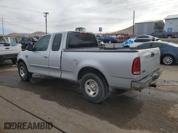 2002 Ford F-150 XL z VIN 1FTRX17W52NA62115, wystawiony jako Copart lot #50415375 z przebiegiem 145 361 mil mil oraz Szkoda całkowita • Salvage title. Historia ofert i sprzedaży dostępna na DreamBid. Obrazek 2.