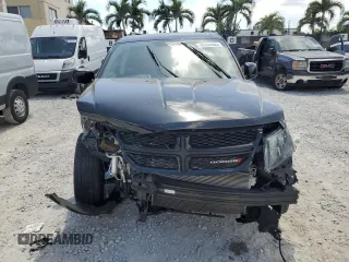 2017 Dodge Journey SXT with VIN 3C4PDCBBXHT701338, listed as a Copart auction lot 48244005 with 66,418 mi miles and Salvage Title. Bid and sale history available at DreamBid. Image 5.