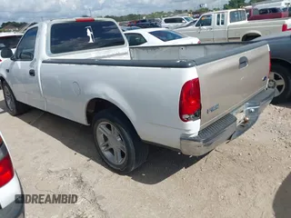 1998 Ford F-150 with VIN 1FTZF1729WKB83429, listed as a IAAI auction lot 42549303 with 173,426 mi miles and . Bid and sale history available at DreamBid. Image 3.
