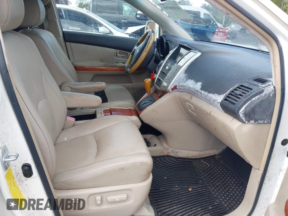 2007 Lexus RX 400h z VIN JTJGW31U372001820, wystawiony jako IAAI lot #41030399 z przebiegiem 91 386 mil mil oraz . Historia ofert i sprzedaży dostępna na DreamBid. Obrazek 5.