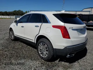 2019 Cadillac XT5 Luxury FWD z VIN 1GYKNCRS6KZ271427, wystawiony jako Copart lot #58873725 z przebiegiem Nie podano mil oraz Szkody całkowita. Historia ofert i sprzedaży dostępna na DreamBid. Obrazek 2.