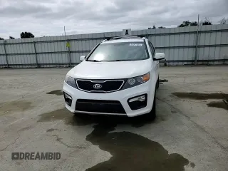 2012 Kia Sorento SX z VIN 5XYKWDA25CG280219, wystawiony jako Copart lot #54397025 z przebiegiem 197 685 mil mil oraz Szkoda całkowita • Salvage title. Historia ofert i sprzedaży dostępna na DreamBid. Obrazek 13.