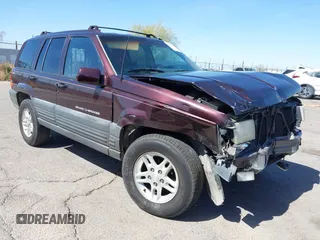 1996 Jeep Grand Cherokee Laredo with VIN 1J4GZ58S3TC391942, listed as a IAAI auction lot 41711778 with 202,765 mi miles. Bid and sale history available at carsss.com. Image 6.