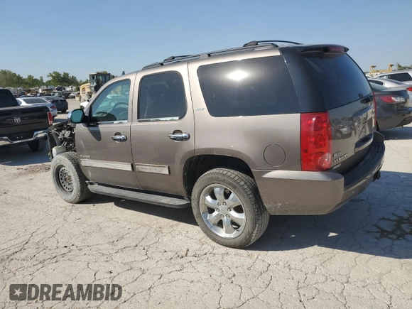 2011 GMC Yukon SLT with VIN 1GKS2CE0XBR361333, listed as a Copart auction lot 73684714 with 259,158 mi miles and Salvage Title. Bid and sale history available at DreamBid. Image 2.