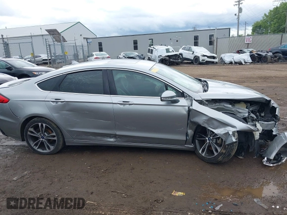 2020 Ford Fusion Titanium with VIN 3FA6P0D98LR115437, listed as a IAAI auction lot 42331052 with 127,346 mi miles and . Bid and sale history available at DreamBid. Image 13.