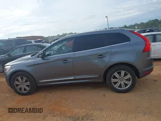 2017 Volvo XC60 Inscription z VIN YV440MDU1H2199868, wystawiony jako IAAI lot #42104412 z przebiegiem 169 841 mil mil oraz . Historia ofert i sprzedaży dostępna na DreamBid. Obrazek 14.