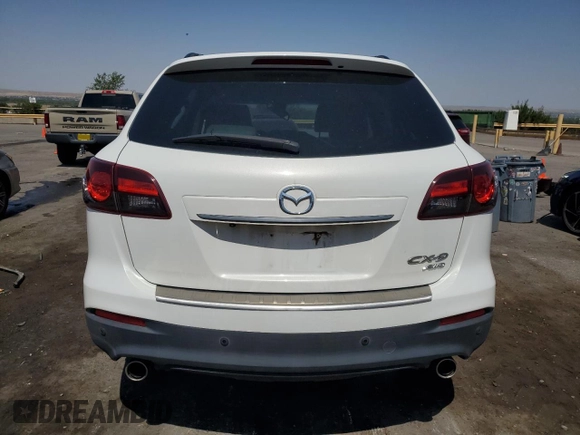 2015 Mazda CX-9 Grand Touring with VIN JM3TB3DA7F0454094, listed as a Copart auction lot 61757035 with 56,997 mi miles and Salvage title. Bid and sale history available at DreamBid. Image 6.