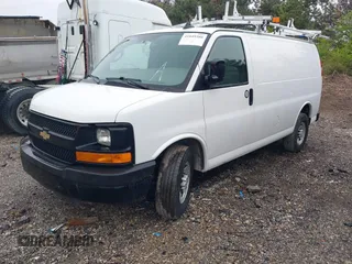 2016 Chevrolet Express Cargo Van with VIN 1GCWGAFF7G1151428, listed as a IAAI auction lot 41849380 with 124,553 mi miles. Bid and sale history available at carsss.com. Image 2.