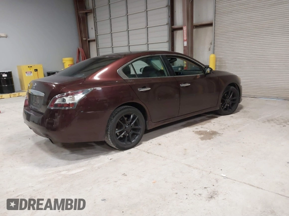2014 Nissan Maxima S with VIN 1N4AA5AP2EC493346, listed as a IAAI auction lot 41630351 with 186,690 mi miles and . Bid and sale history available at DreamBid. Image 4.
