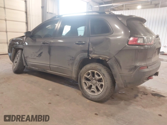 2020 Jeep Cherokee Trailhawk z VIN 1C4PJMBX8LD627104, wystawiony jako IAAI lot #41493732 z przebiegiem 46 463 mil mil oraz . Historia ofert i sprzedaży dostępna na DreamBid. Obrazek 3.