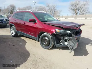 2020 Jeep Cherokee Latitude with VIN 1C4PJLCB9LD605531, listed as a IAAI auction lot 41541614 with 90,979 mi miles. Bid and sale history available at carsss.com. Image 1.