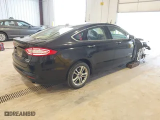 2016 Ford Fusion Titanium Hybrid with VIN 3FA6P0RU7GR127307, listed as a IAAI auction lot 41944427 with 128,076 mi miles. Bid and sale history available at carsss.com. Image 4.