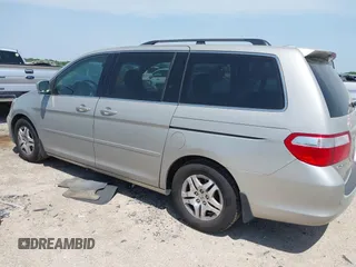 2007 Honda Odyssey EX-L with VIN 5FNRL38757B431334, listed as a IAAI auction lot 42026018 with 135,898 mi miles. Bid and sale history available at carsss.com. Image 3.
