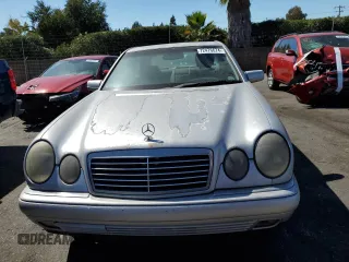 1999 Mercedes-Benz E-Class with VIN WDBJF65H3XA882627, listed as a Copart auction lot 72476674 with 187,656 mi miles and Salvage Title. Bid and sale history available at carsss.com. Image 5.