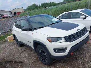 2019 Jeep Compass Trailhawk z VIN 3C4NJDDB3KT760631, wystawiony jako IAAI lot #42681139 z przebiegiem 71 128 mil mil oraz . Historia ofert i sprzedaży dostępna na DreamBid. Obrazek 1.