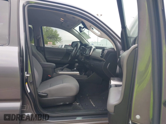 2018 Toyota Tacoma SR5 with VIN 5TFAZ5CN5JX062498, listed as a IAAI auction lot 41867393 with 128,879 mi miles and . Bid and sale history available at DreamBid. Image 5.