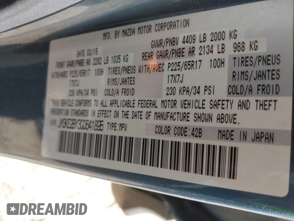 2016 Mazda CX-5 Sport with VIN JM3KE2BY3G0641895, listed as a IAAI auction lot 41689138 with 121,636 mi miles and . Bid and sale history available at DreamBid. Image 9.