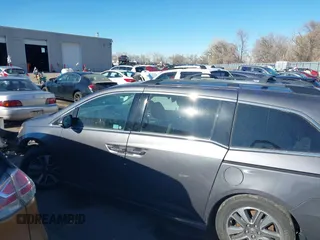 2015 Honda Odyssey Touring Elite with VIN 5FNRL5H98FB024958, listed as a IAAI auction lot 41361558 with 212,806 mi miles and . Bid and sale history available at DreamBid. Image 15.