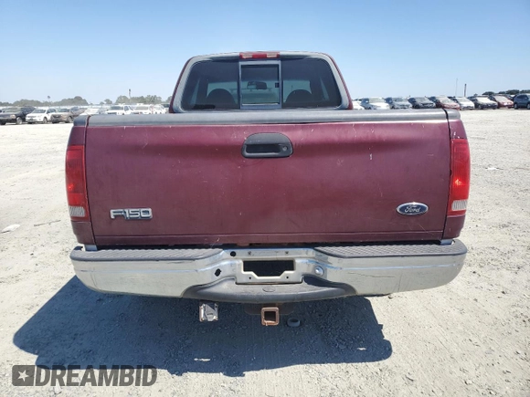 1999 Ford F-150 XL with VIN 1FTRX17L2XKB78998, listed as a Copart auction lot 65004535 with 155,271 mi miles and Salvage title. Bid and sale history available at DreamBid. Image 6.