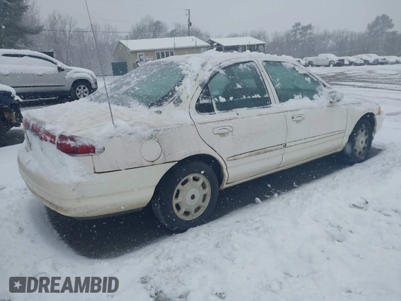 1996 Mercury Mystique z VIN 1MELM653XTK605481, wystawiony jako IAAI lot #41543215 z przebiegiem 120 988 mil mil oraz . Historia ofert i sprzedaży dostępna na DreamBid. Obrazek 4.