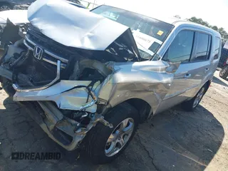 2013 Honda Pilot EX-L with VIN 5FNYF3H59DB022797, listed as a IAAI auction lot 41880675 with 206,359 mi miles and . Bid and sale history available at DreamBid. Image 17.