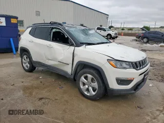 2019 Jeep Compass Latitude z VIN 3C4NJDBB2KT703341, wystawiony jako Copart lot #55974345 z przebiegiem 54 822 mil mil oraz Szkoda całkowita • Salvage title. Historia ofert i sprzedaży dostępna na DreamBid. Obrazek 4.