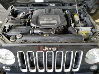 2017 Jeep Wrangler Unlimited Sahara с VIN 1C4HJWEG7HL575506, выставлен на аукционе Copart как лот 64185925 с пробегом 103 292 миль миль и Списание • Salvage title. История ставок и продаж доступна на DreamBid. Изображение 12.