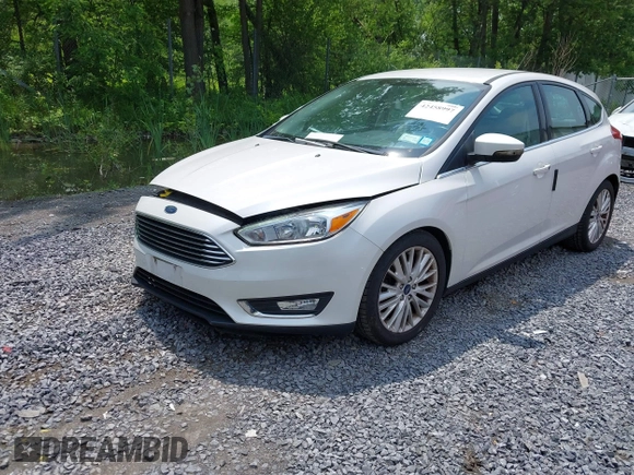 2016 Ford Focus Titanium with VIN 1FADP3N26GL332709, listed as a IAAI auction lot 42458997 with 75,509 mi miles and . Bid and sale history available at DreamBid. Image 2.