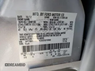 2012 Ford F-350 XL z VIN 1FT8W3BT4CED21590, wystawiony jako Copart lot #53383565 z przebiegiem 149 855 mil mil oraz Szkoda całkowita • Salvage title. Historia ofert i sprzedaży dostępna na DreamBid. Obrazek 14.