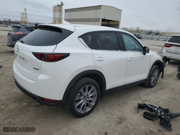 2021 Mazda CX-5 Grand Touring with VIN JM3KFBDM3M1373069, listed as a Copart auction lot 43573915 with 37,479 mi miles and Salvage Title. Bid and sale history available at carsss.com. Image 3.