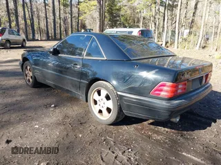 1999 Mercedes-Benz SL-Class with VIN WDBFA68F9XF187036, listed as a IAAI auction lot 41542221 with 114,602 mi miles. Bid and sale history available at carsss.com. Image 3.