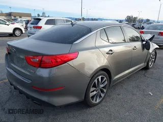 2014 Kia Optima SX Turbo with VIN 5XXGR4A63EG291596, listed as a IAAI auction lot 41385491 with 265,017 mi miles and . Bid and sale history available at DreamBid. Image 4.