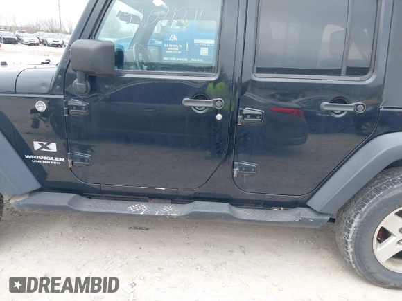 2007 Jeep Wrangler Unlimited X with VIN 1J4GA39177L153387, listed as a IAAI auction lot 42021211 with 207,965 mi miles and . Bid and sale history available at DreamBid. Image 14.