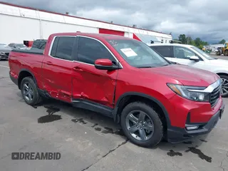 2023 Honda Ridgeline RTL z VIN 5FPYK3F51PB015501, wystawiony jako IAAI lot #42422286 z przebiegiem 31 305 mil mil oraz . Historia ofert i sprzedaży dostępna na DreamBid. Obrazek 1.