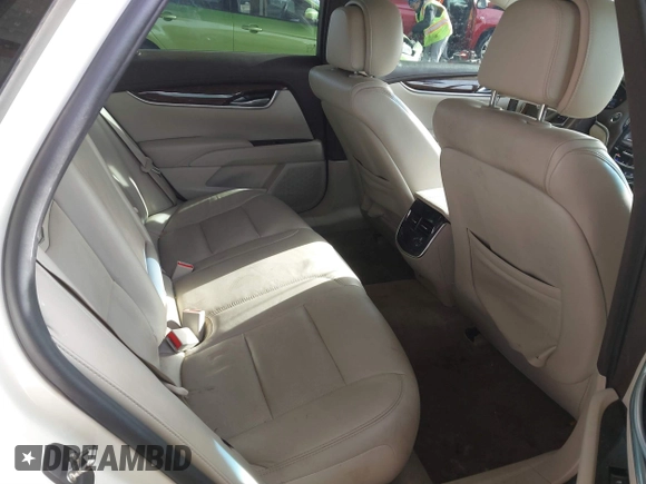 2014 Cadillac XTS Luxury with VIN 2G61M5S35E9199253, listed as a IAAI auction lot 41400558 with 112,955 mi miles. Bid and sale history available at carsss.com. Image 8.