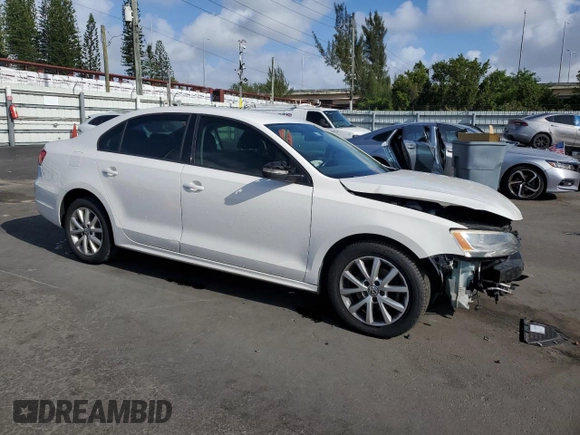 2011 Volkswagen Jetta SE with VIN 3VWDX7AJ0BM322566, listed as a Copart auction lot 51536505 with 143,266 mi miles and Salvage title. Bid and sale history available at DreamBid. Image 4.
