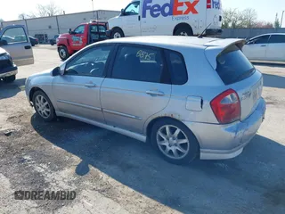2006 Kia Spectra with VIN KNAFE161265317272, listed as a IAAI auction lot 42008875 with 169,983 mi miles. Bid and sale history available at carsss.com. Image 3.