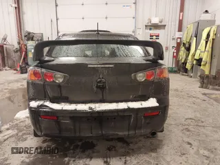 2015 Mitsubishi Lancer SE with VIN JA32V2FW6FU019508, listed as a IAAI auction lot 41633196 with 91,758 mi miles. Bid and sale history available at carsss.com. Image 16.