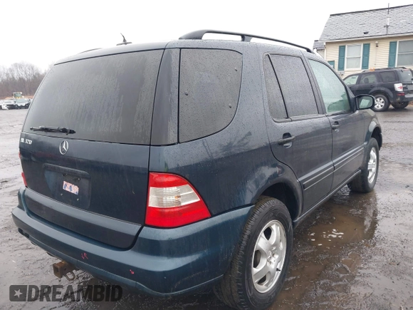 2003 Mercedes-Benz M-Class 3.2L with VIN 4JGAB54EX3A390987, listed as a IAAI auction lot 41482335 with 191,381 mi miles. Bid and sale history available at carsss.com. Image 4.