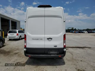 2021 Ford Transit Cargo с VIN 1FTBR1X89MKA53998, выставлен на аукционе Copart как лот 59292575 с пробегом 85 472 миль миль и Списание • Salvage title. История ставок и продаж доступна на DreamBid. Изображение 6.