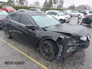 2015 Acura TLX V6 with VIN 19UUB2F36FA009038, listed as a IAAI auction lot 41540695 with 125,617 mi miles. Bid and sale history available at carsss.com. Image 1.