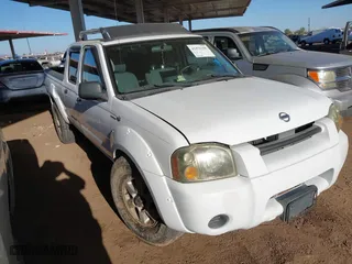 2003 Nissan Frontier 4WD SVE with VIN 1N6MD29Y93C451874, listed as a IAAI auction lot 41470198 with 216,482 mi miles. Bid and sale history available at carsss.com. Image 1.