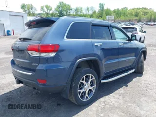 2021 Jeep Grand Cherokee 80th Anniversary with VIN 1C4RJFBGXMC775539, listed as a IAAI auction lot 42241659 with 23,541 mi miles and . Bid and sale history available at DreamBid. Image 4.