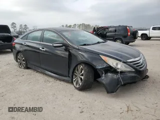 2014 Hyundai Sonata SE with VIN 5NPEC4AC8EH816221, listed as a Copart auction lot 44825285 with 128,043 mi miles and Salvage Title. Bid and sale history available at DreamBid. Image 4.